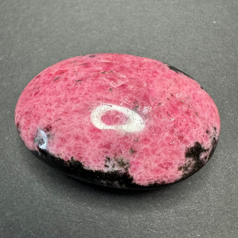 Rhodonite palm stone