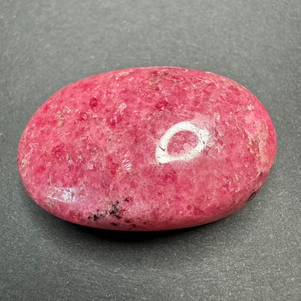Rhodonite palm stone