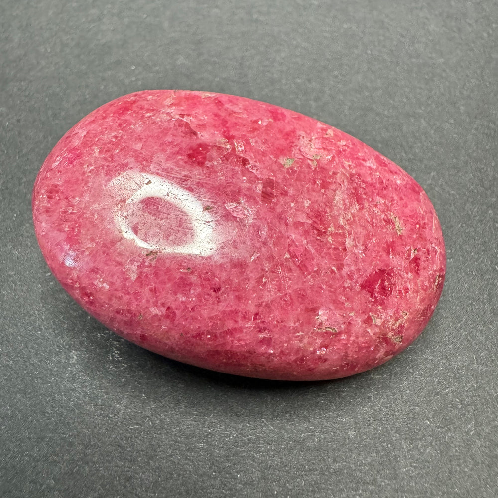 Rhodonite palm stone