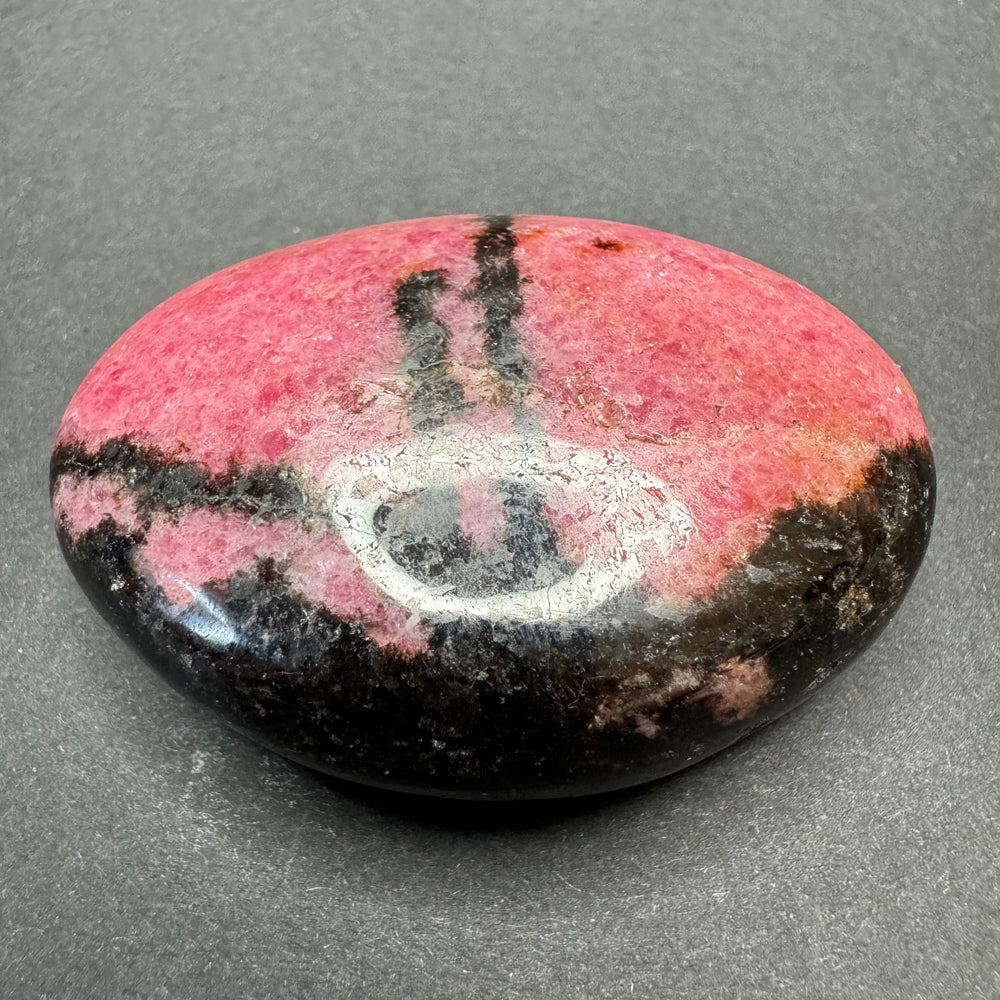 Rhodonite palm stone