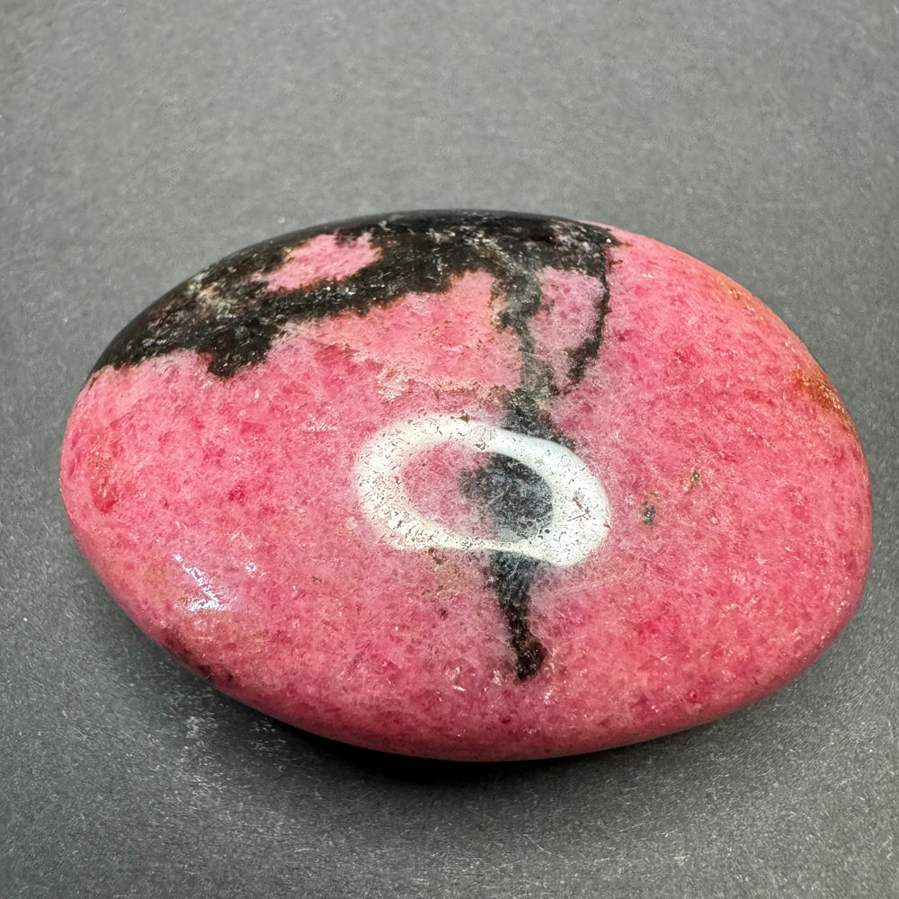 Rhodonite palm stone