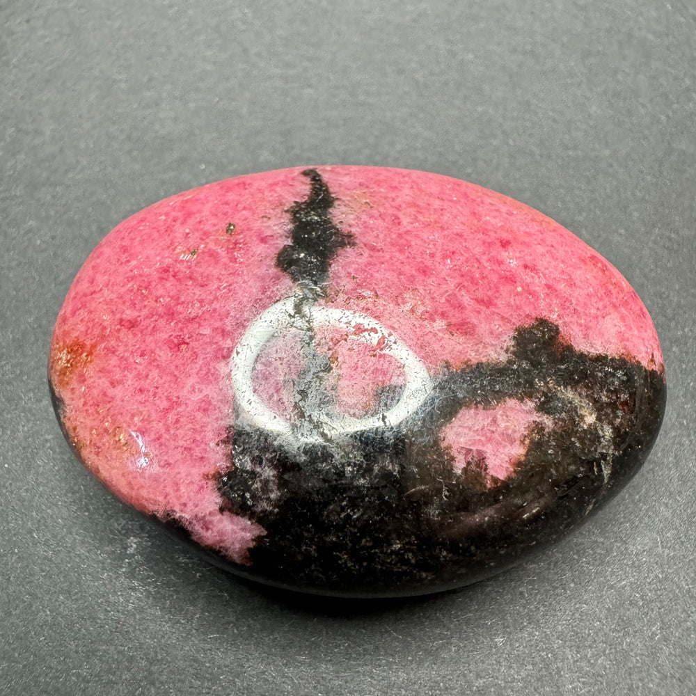 Rhodonite palm stone
