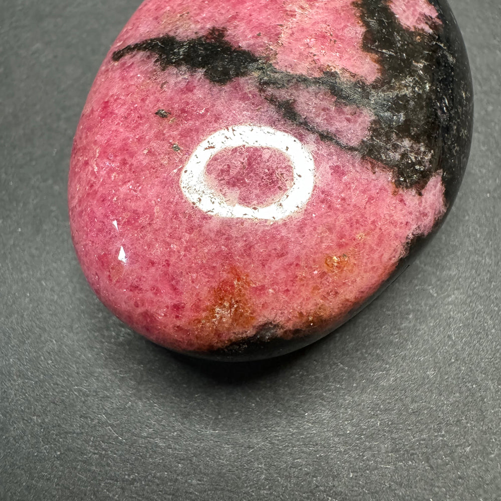 Rhodonite palm stone