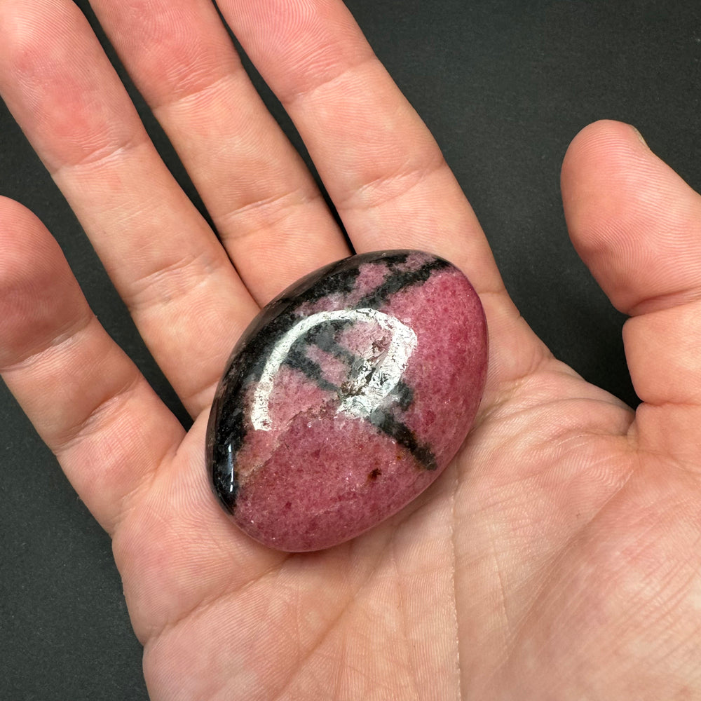 Rhodonite palm stone