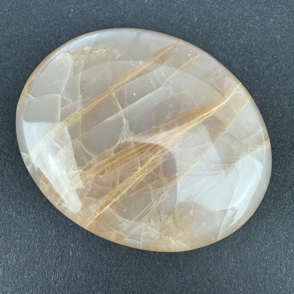 Moonstone palm stone