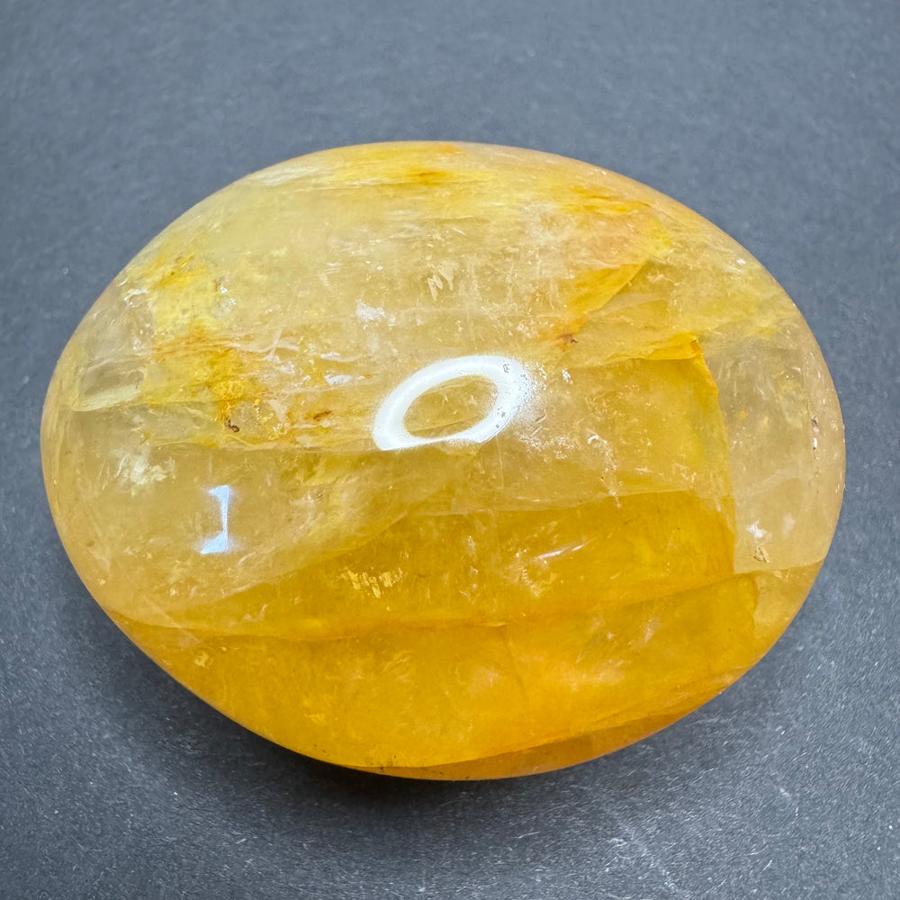 Golden Healer palm stone