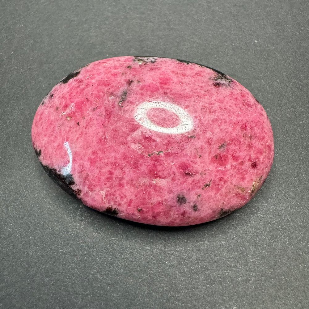 Rhodonite palm stone