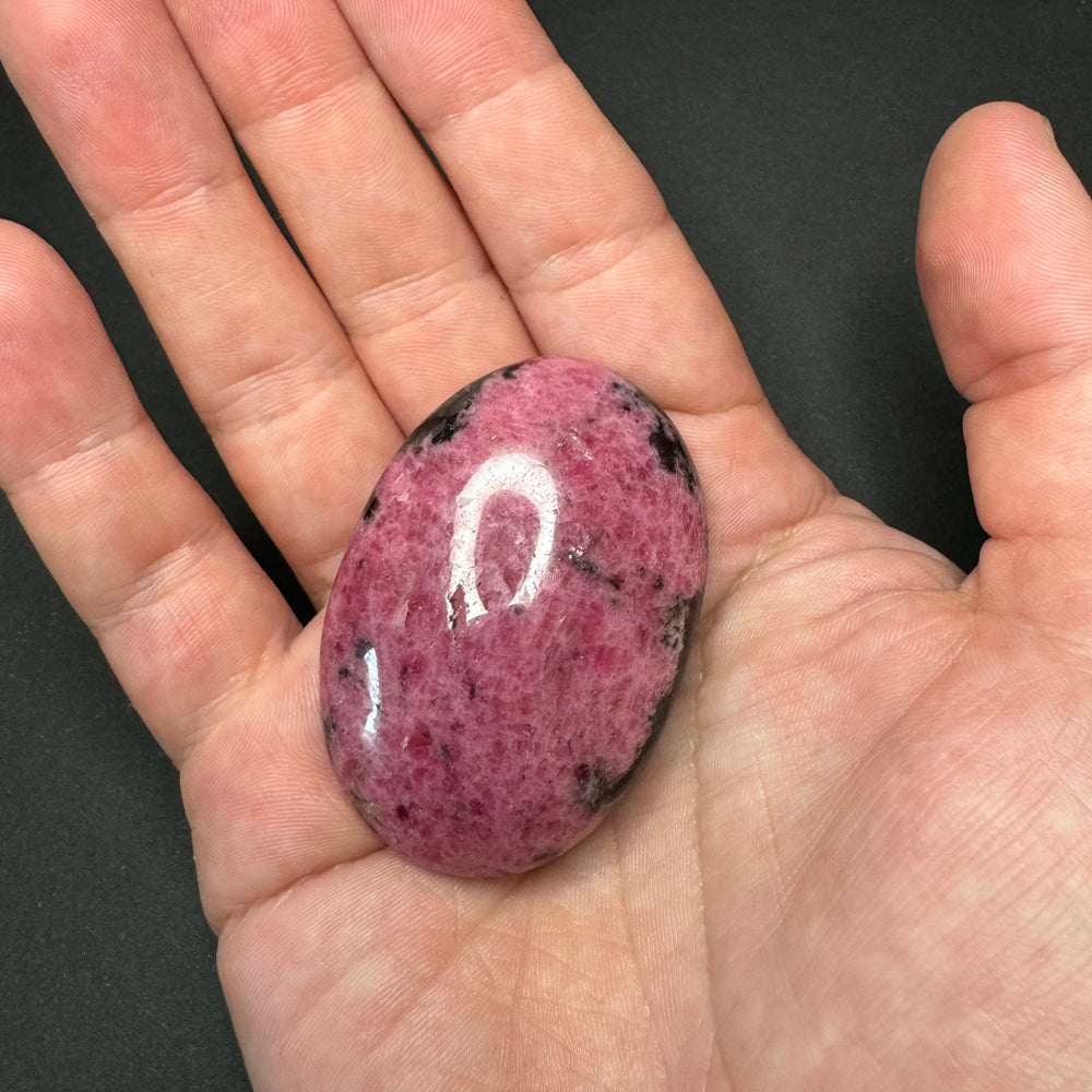 Rhodonite palm stone
