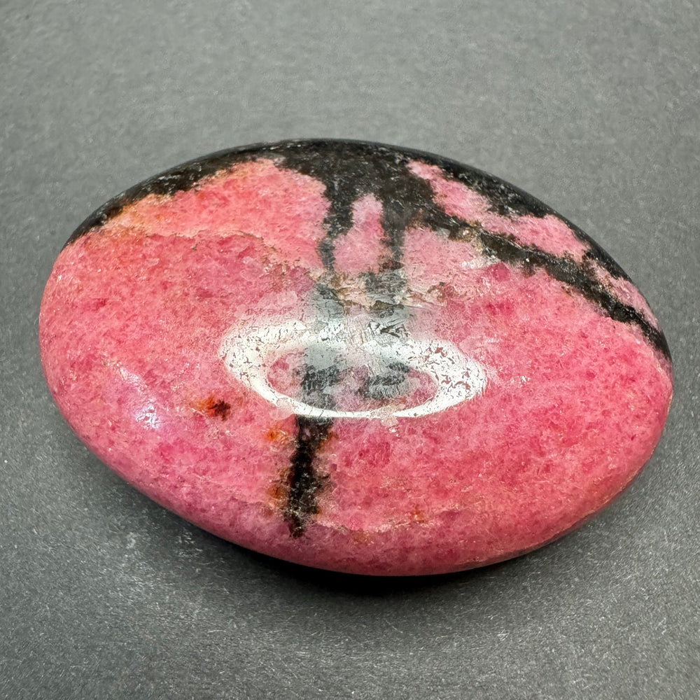 Rhodonite palm stone